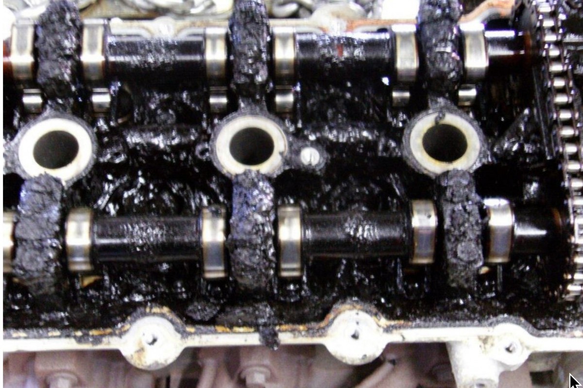 Oil gunked up on an engine.