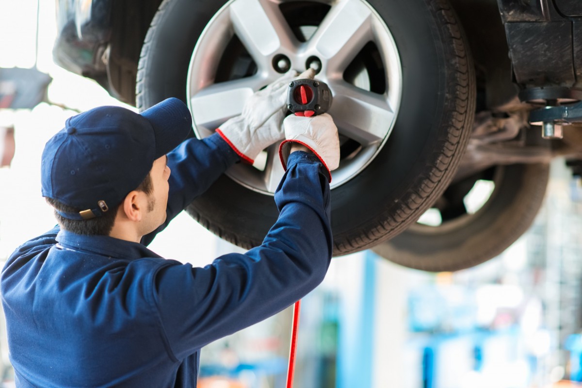 Tire being serviced in a shop